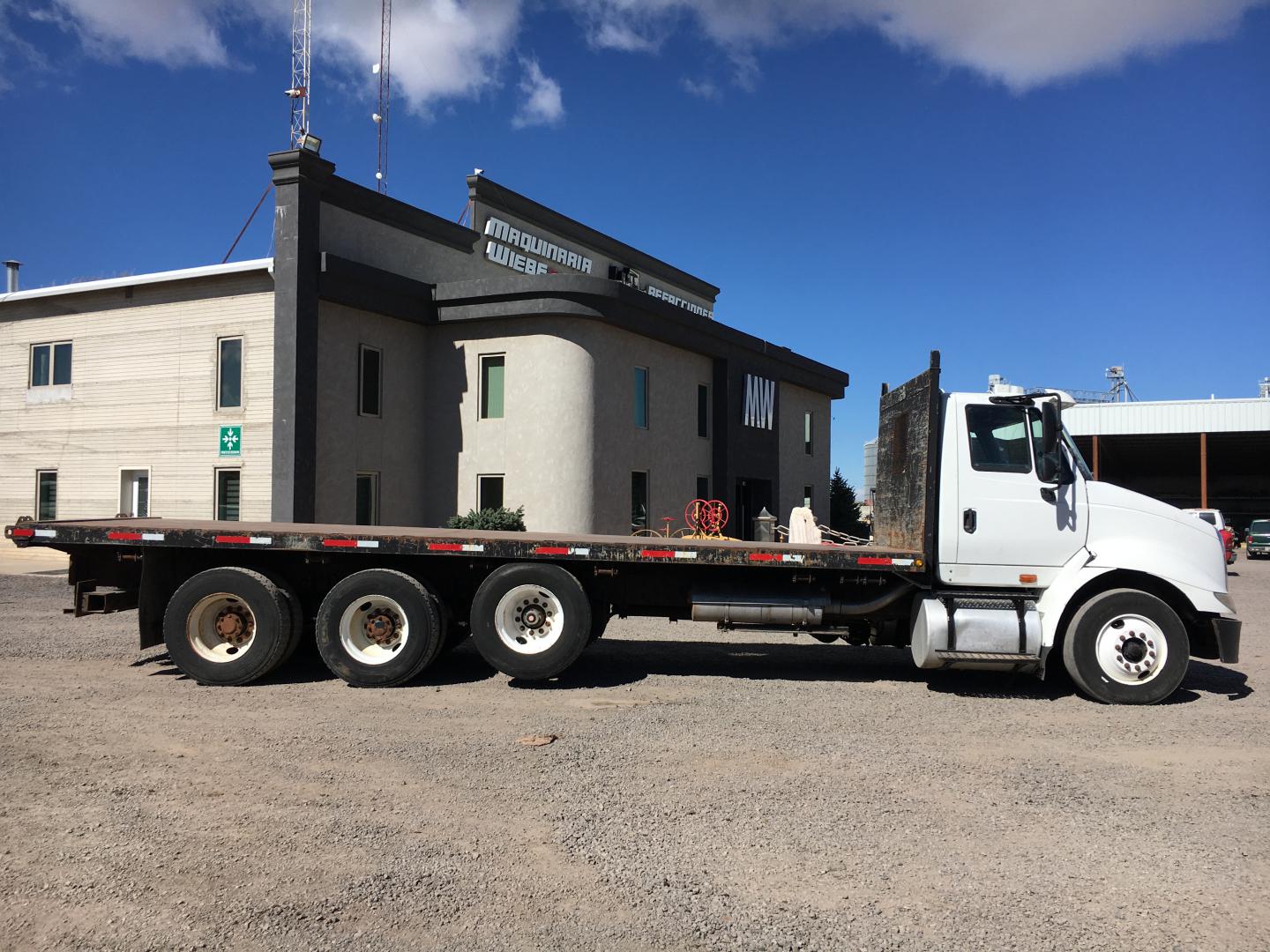 ./imagenes/INVOICE/2019/16650/CAMION CON PLATAFORMA INTERNATIONAL 8600 SBA 6X4 (1).JPG